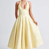 Evelyn | Sleeveless jacquard maxi dress with halter neckline