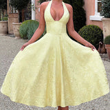 Evelyn | Sleeveless jacquard maxi dress with halter neckline
