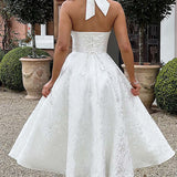 Evelyn | Sleeveless jacquard maxi dress with halter neckline