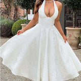 Evelyn | Sleeveless jacquard maxi dress with halter neckline