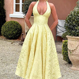 Evelyn | Sleeveless jacquard maxi dress with halter neckline