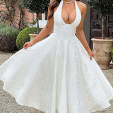 Evelyn | Sleeveless jacquard maxi dress with halter neckline