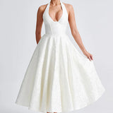 Evelyn | Sleeveless jacquard maxi dress with halter neckline