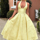 Evelyn | Sleeveless jacquard maxi dress with halter neckline