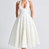 Evelyn | Sleeveless jacquard maxi dress with halter neckline