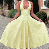 Evelyn | Sleeveless jacquard maxi dress with halter neckline