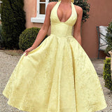 Evelyn | Sleeveless jacquard maxi dress with halter neckline