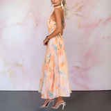Bridget | Chic halter neck maxi dress with flowing silhouette