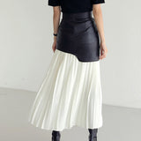 Orla | Asymmetrical pleated maxi skirt with coated finish