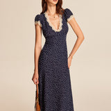 Noralisse | Polka Dot Midi Dress with Lace Details and Puff Sleeves