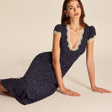 Noralisse | Polka Dot Midi Dress with Lace Details and Puff Sleeves