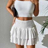 Ivy | High-waisted ruffle mini skirt with smocked waist