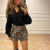 Ivy | High-waisted ruffle mini skirt with smocked waist