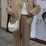 Sylvena | Oversized wool jacket with asymmetric button closure and generous pockets