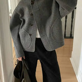 Sylvena | Oversized wool jacket with asymmetric button closure and generous pockets