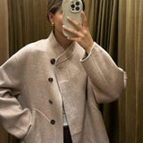 Sylvena | Oversized wool jacket with asymmetric button closure and generous pockets