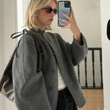 Sylvena | Oversized wool jacket with asymmetric button closure and generous pockets